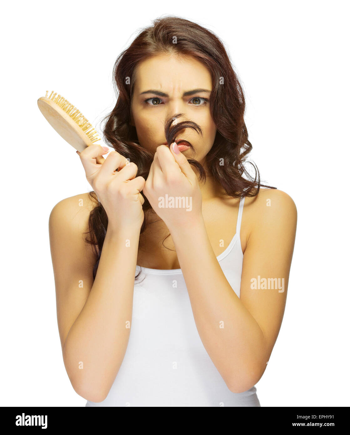Young girl with hair brush isolated Stock Photo Alamy