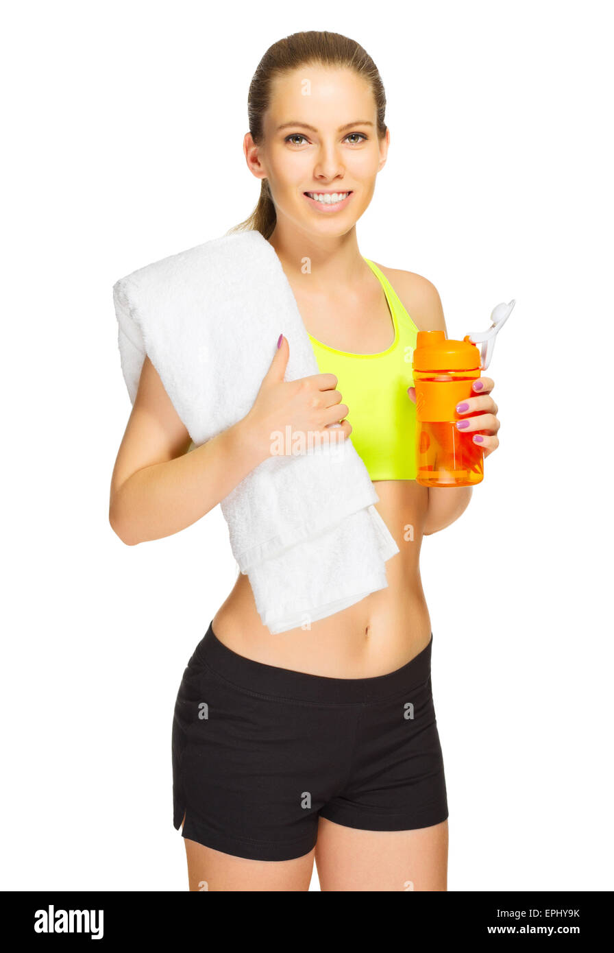 Young sporty girl with towel and water bottle isolated Stock Photo - Alamy
