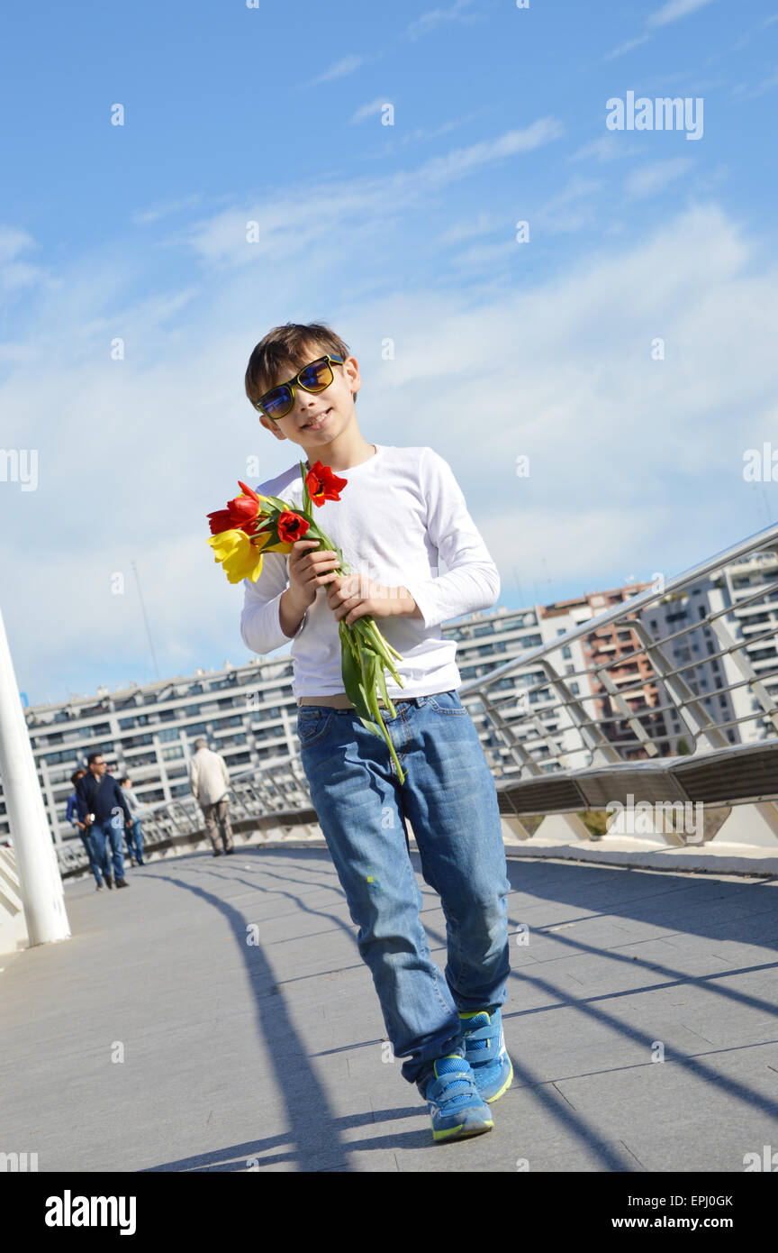 boy with flowers Stock Photo