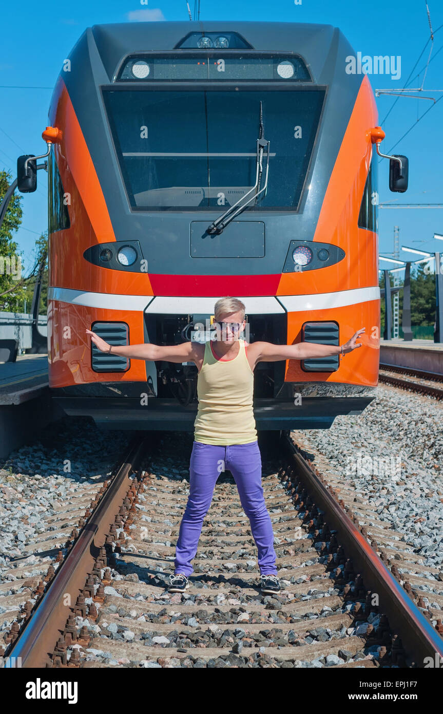 Young trendy guy in front of train Stock Photo Alamy
