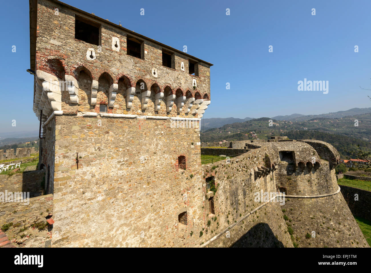 view of high tower and dungeon on the ramparts at ancient Castle , shot ...