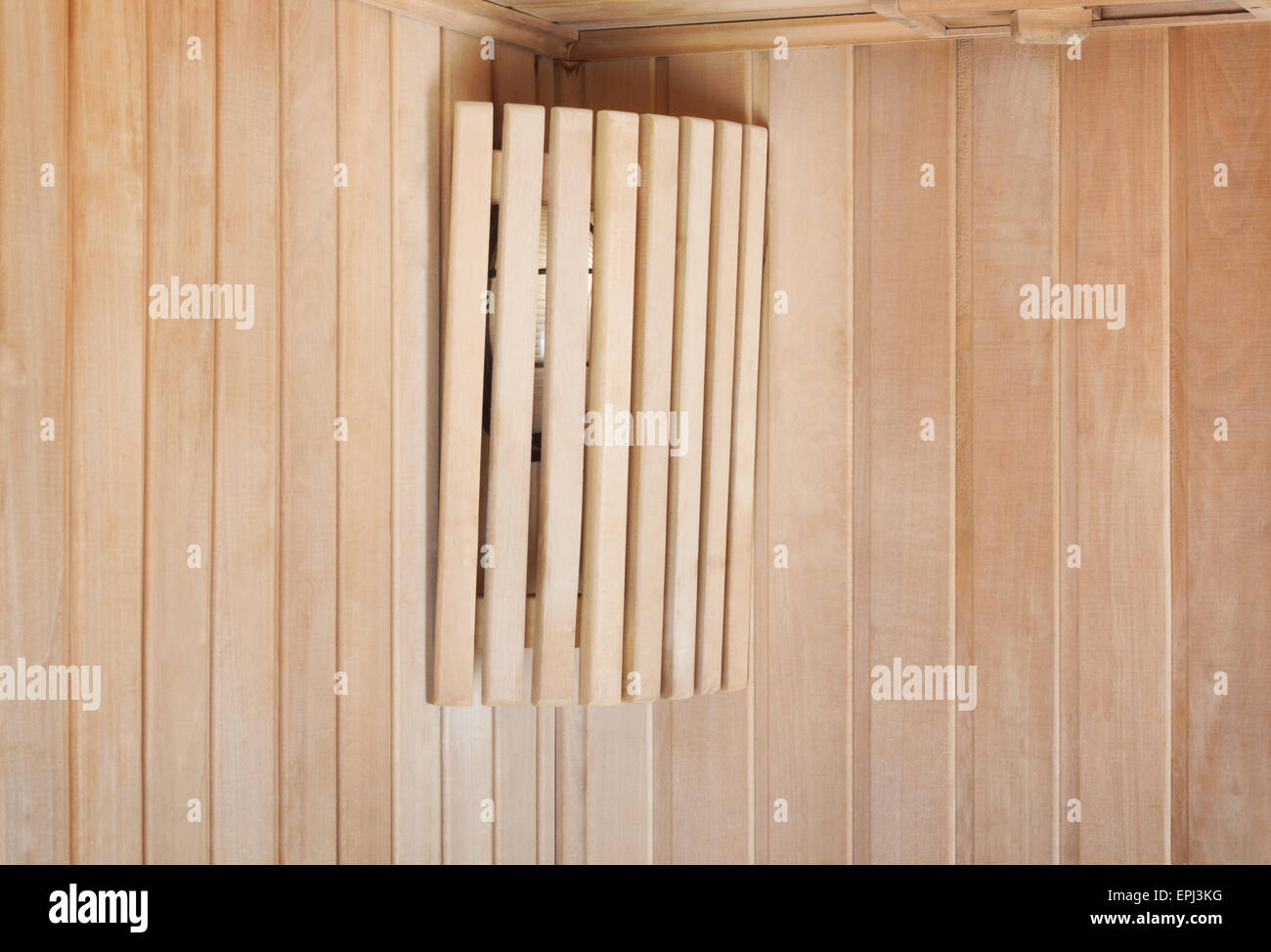 Bright lamp on the wall of  traditional wooden sauna Stock Photo