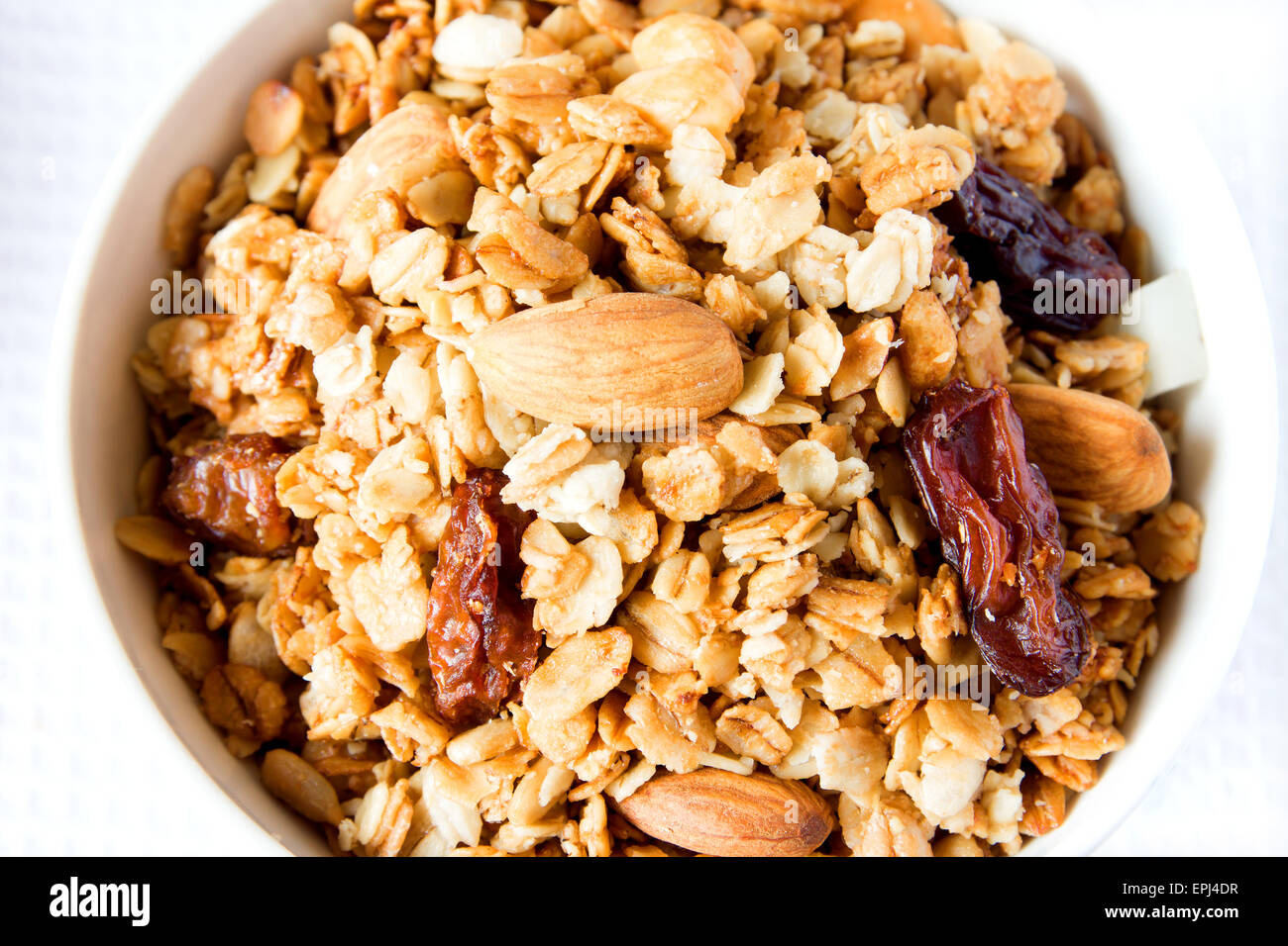 Wholegrain musli (granola) close up texture with raisin, dry fruits ...