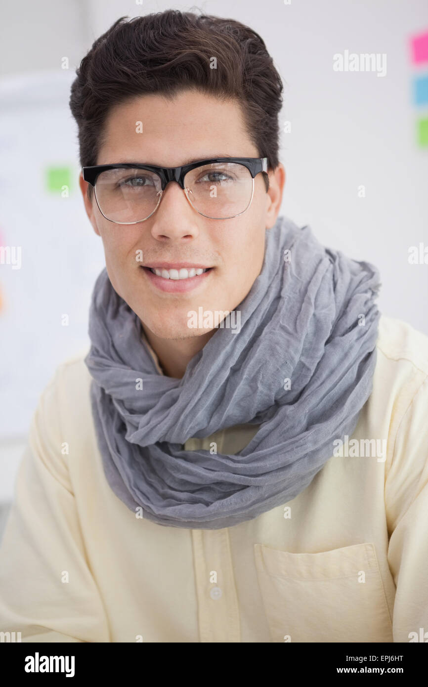 Portrait of a businessman smiling at camera Stock Photo - Alamy