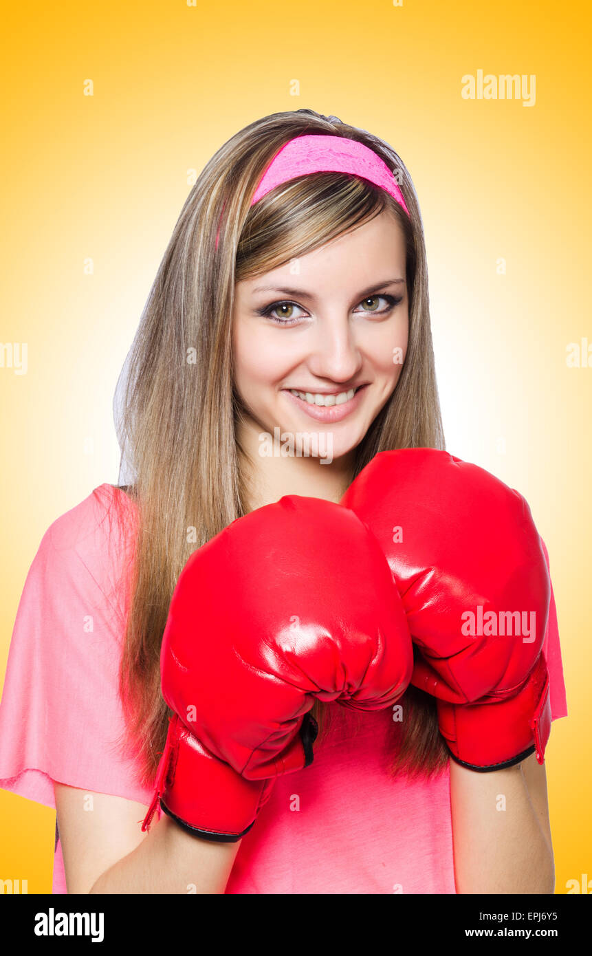 Young lady with boxing gloves on white Stock Photo Alamy