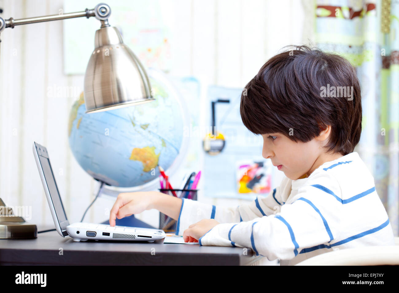 young student working on a computer Stock Photo - Alamy