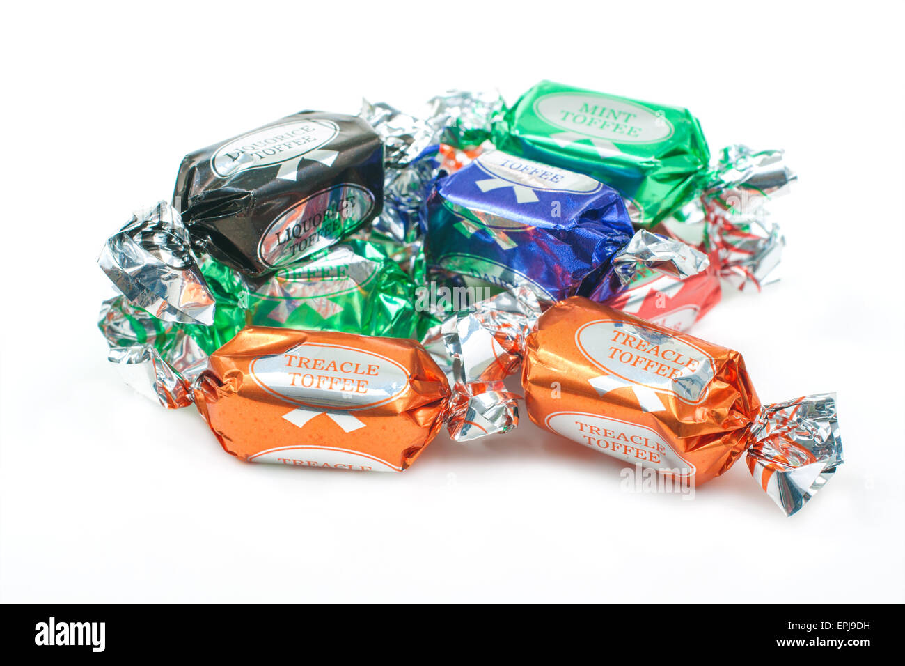 Assorted flavour toffees in colourful wrappers Stock Photo