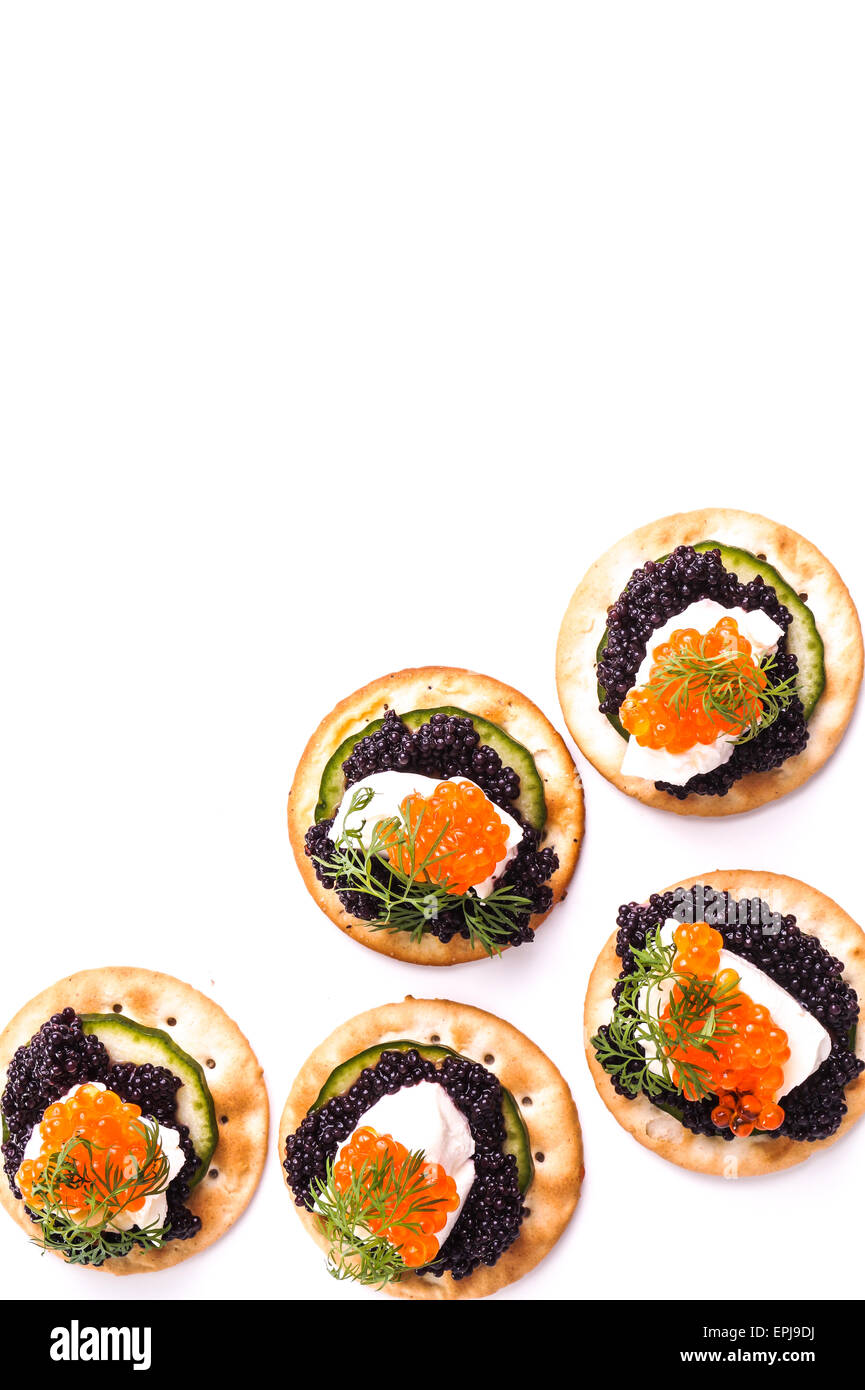 Caviar Appetizer served on crackers isolated on white Stock Photo Alamy