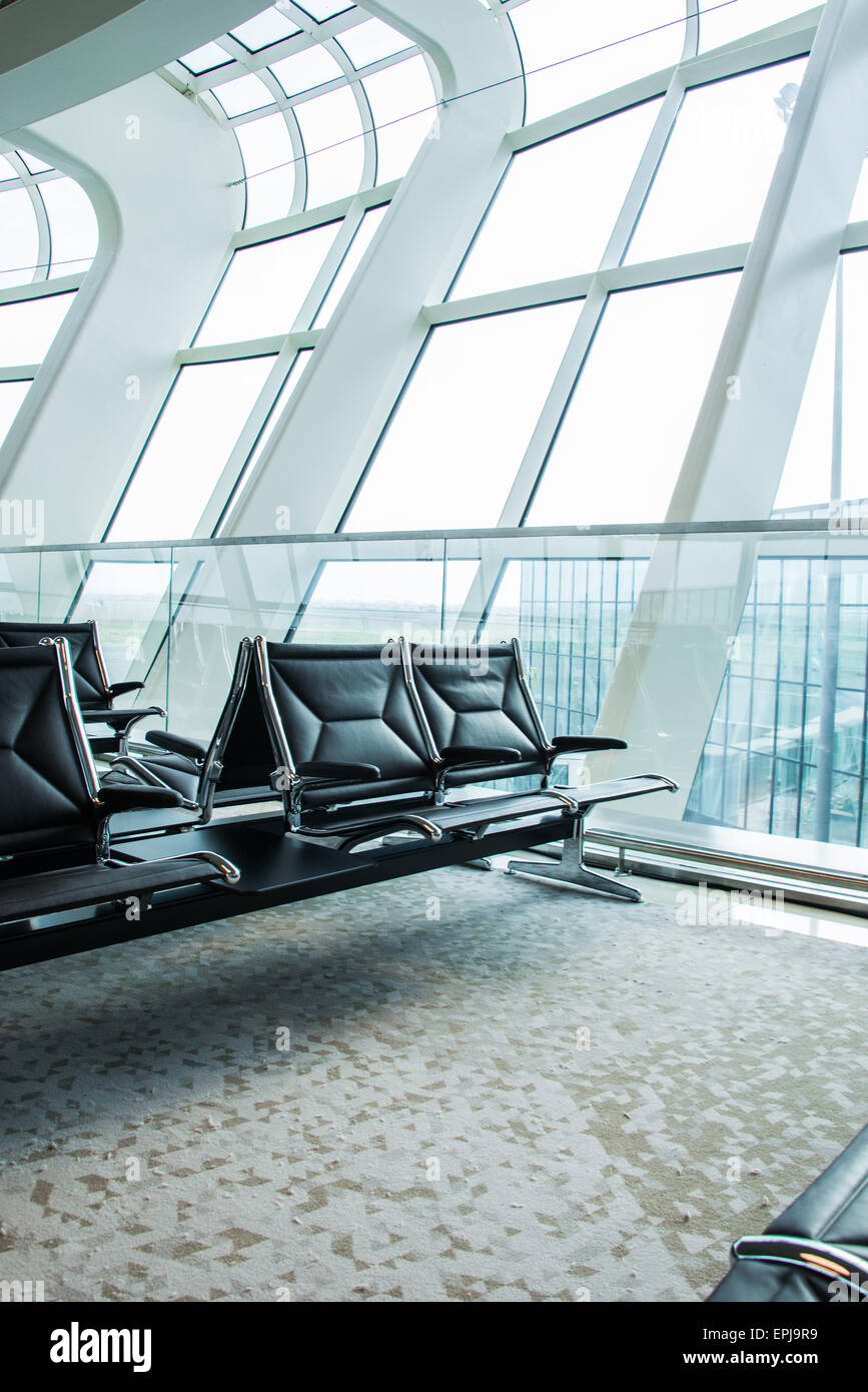 Chairs in the airport lounge area Stock Photo