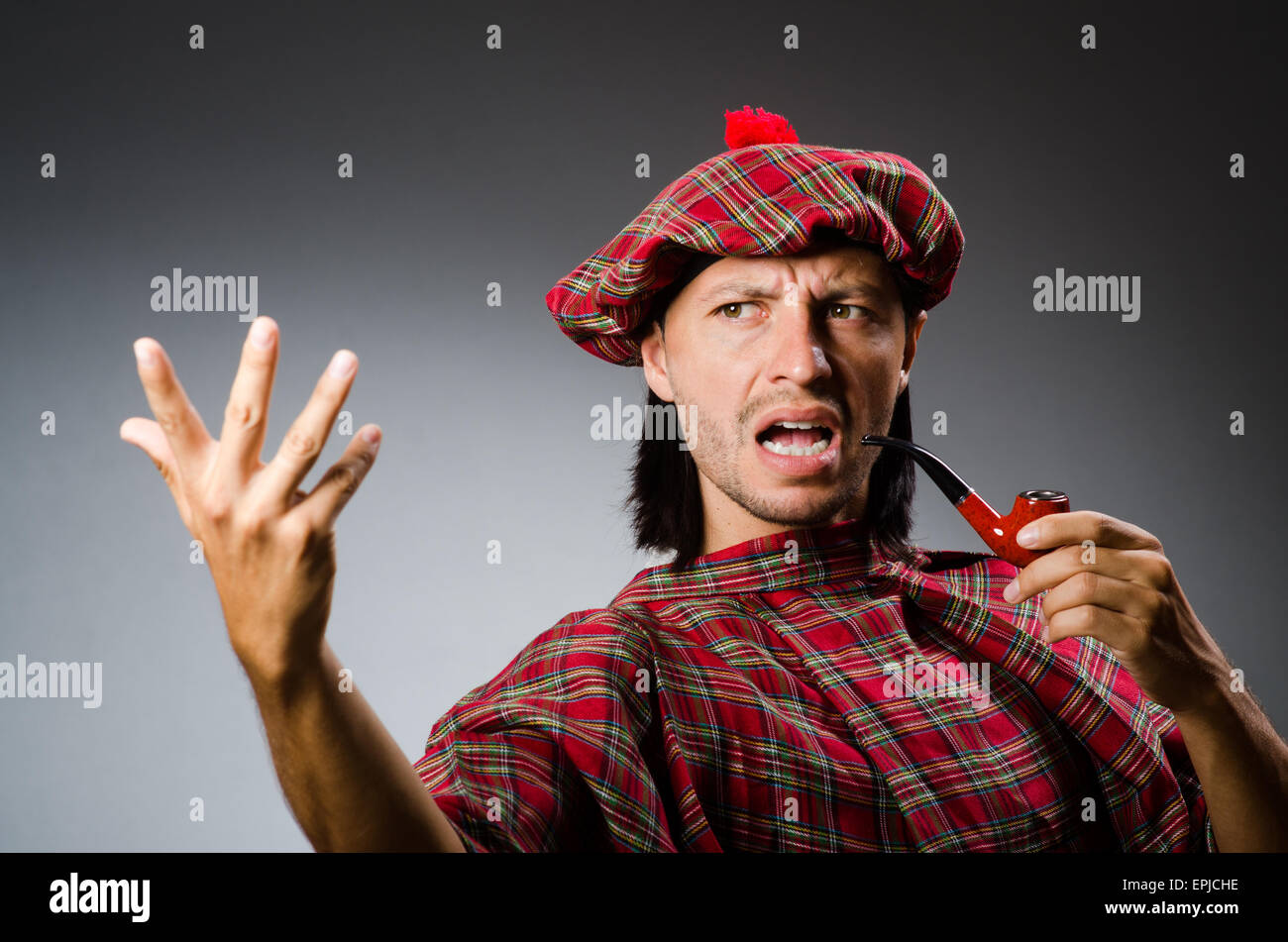 Funny scotsman with smoking pipe Stock Photo Alamy
