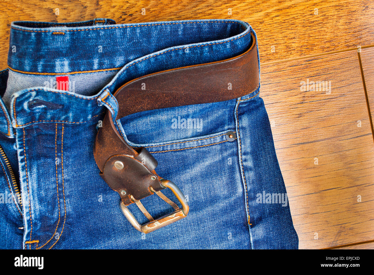 blue jeans with a leather belt Stock Photo