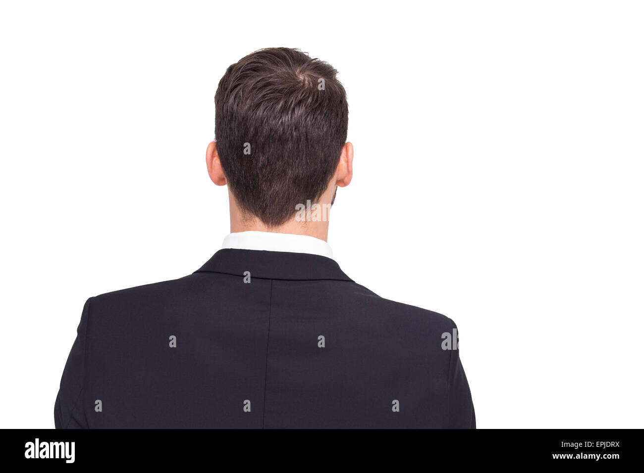 Rear view of businessman in suit standing Stock Photo - Alamy