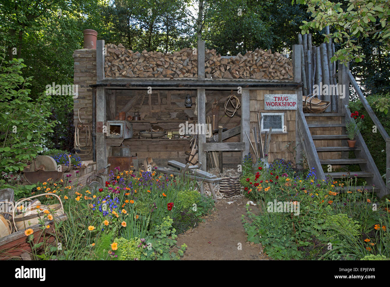 Chelsea, London, UK. 19th May, 2015. Future Climate info, A trugmaker's garden at Chelsea Flower Show 2015. Credit:  Keith Larby/Alamy Live News Stock Photo