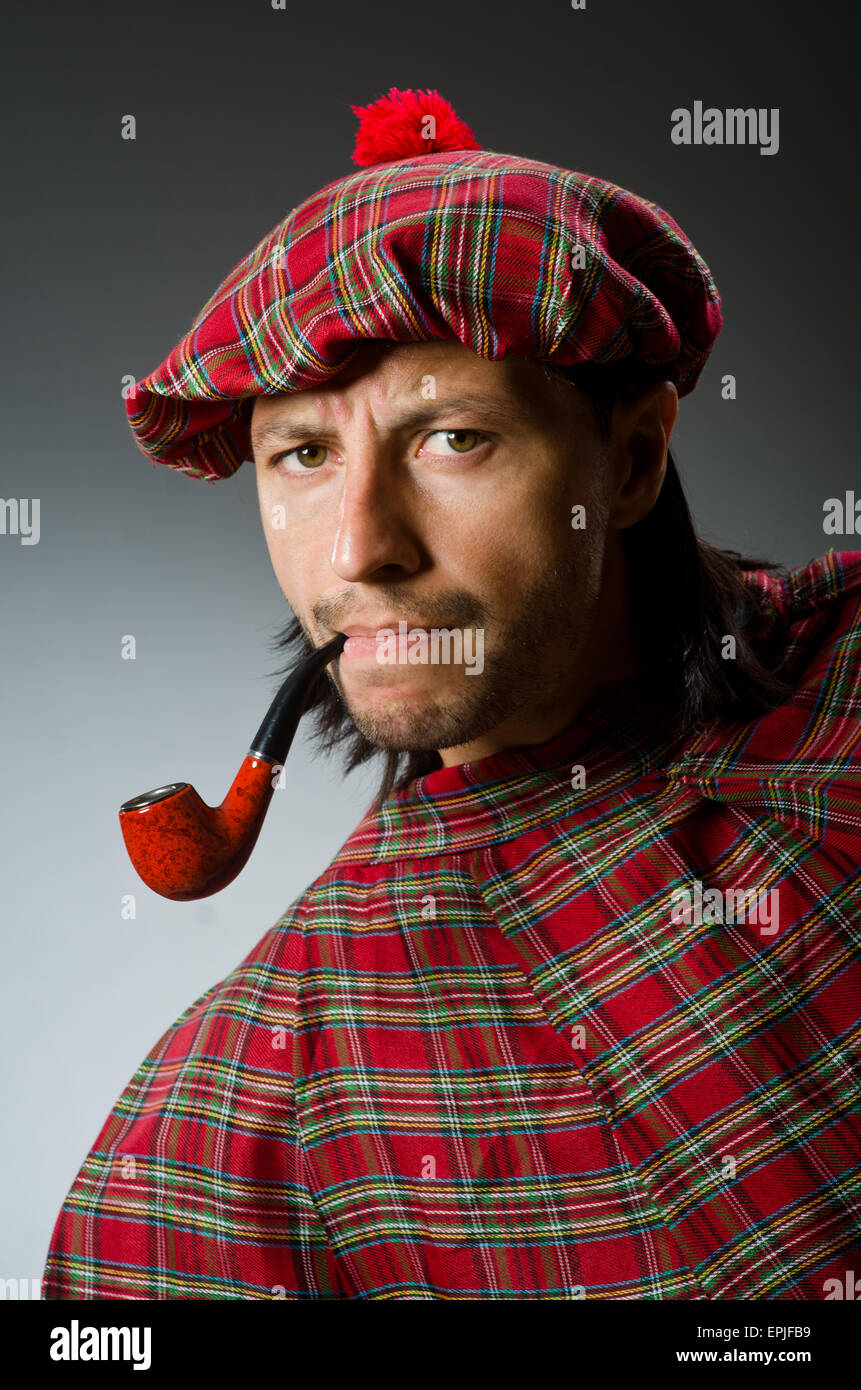 Funny scotsman with smoking pipe Stock Photo Alamy