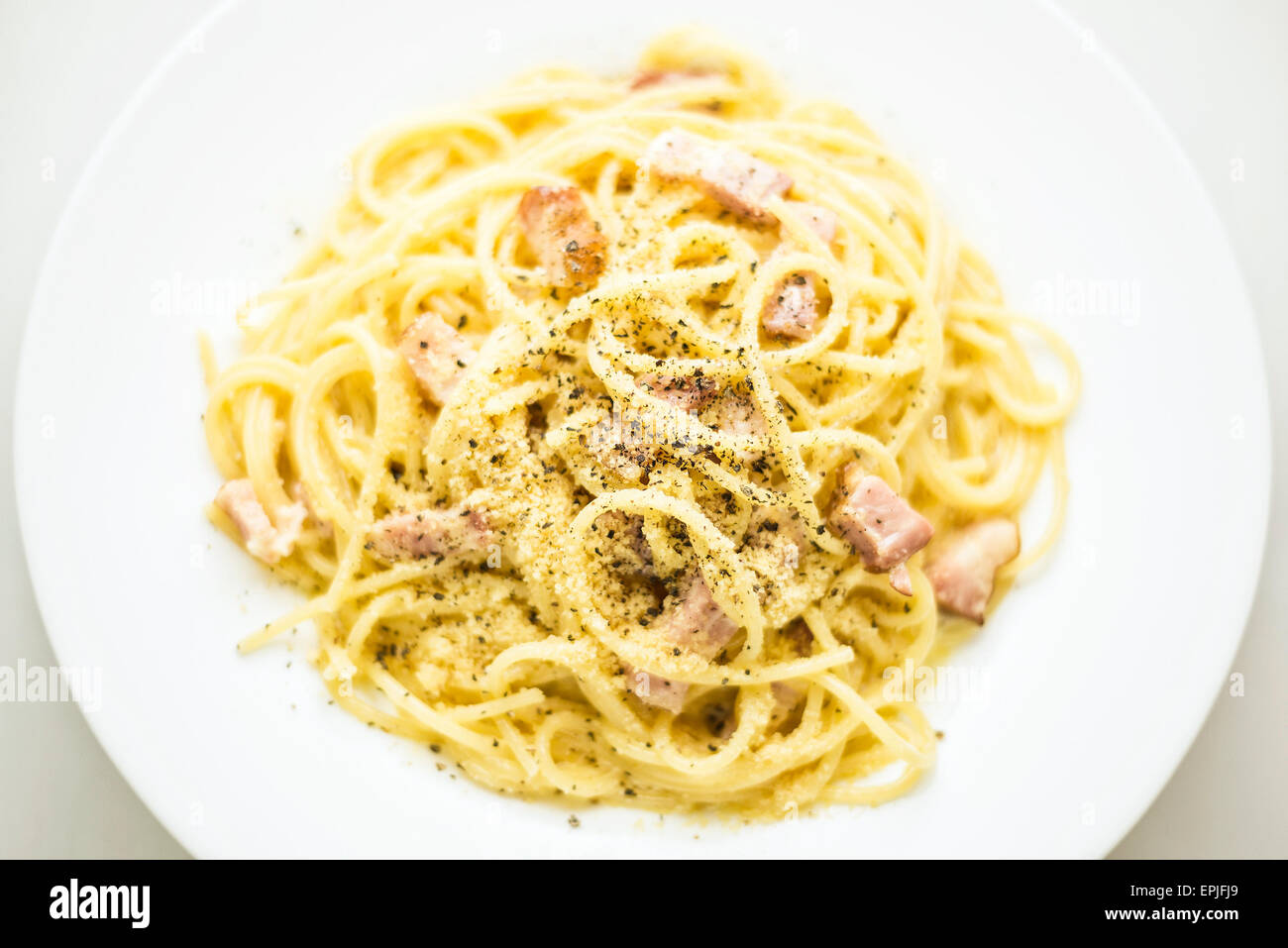 overhead view of spaghetti carbonara classic italian pasta dish Stock Photo