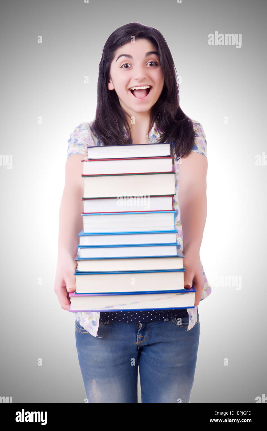 Young female student with books on white Stock Photo - Alamy