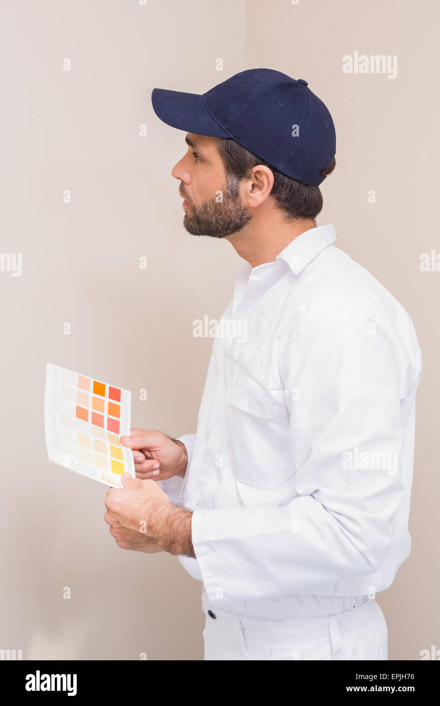 Painter holding a colour chart Stock Photo