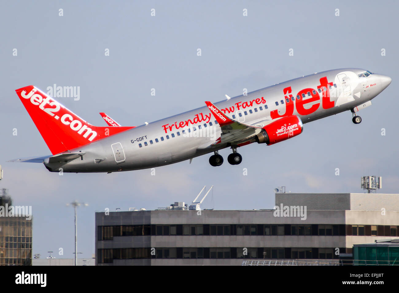 Jet2 Boeing 737-300 climbs away from runway 05L at Manchester airport. Stock Photo