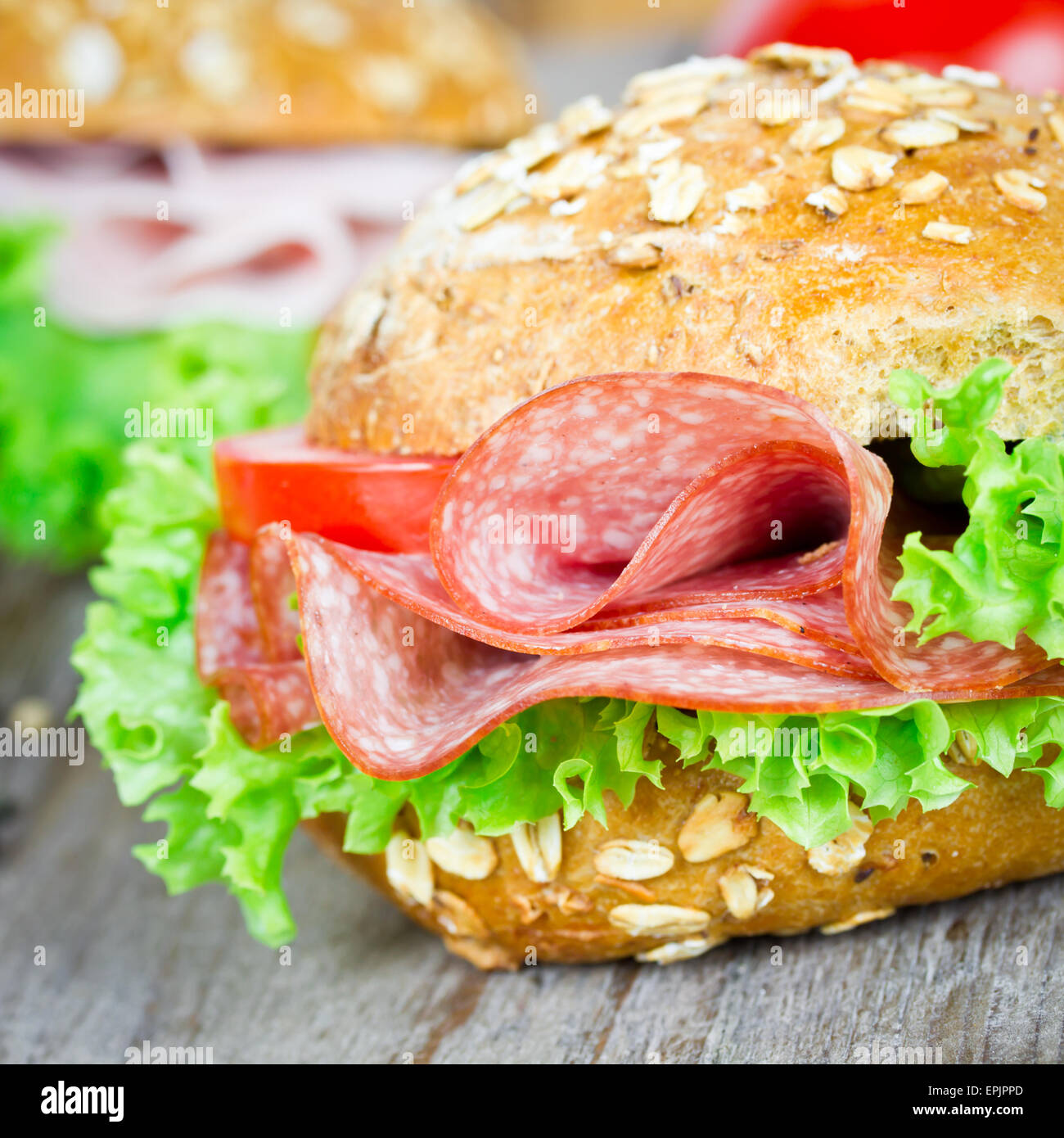 bun with salami Stock Photo