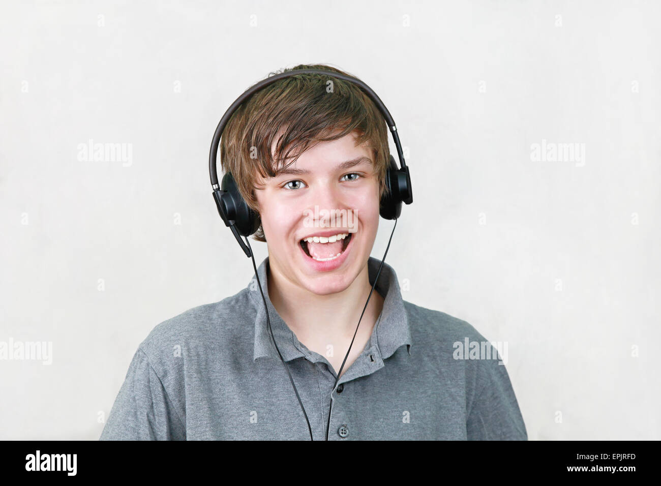 Boy with headphones Stock Photo - Alamy