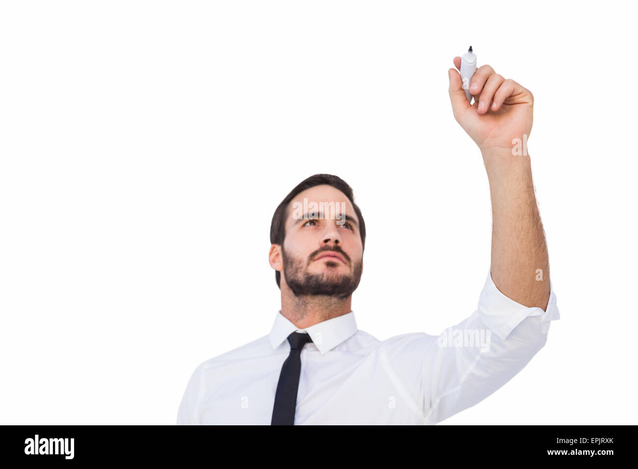 Focused businessman writing with marker Stock Photo - Alamy