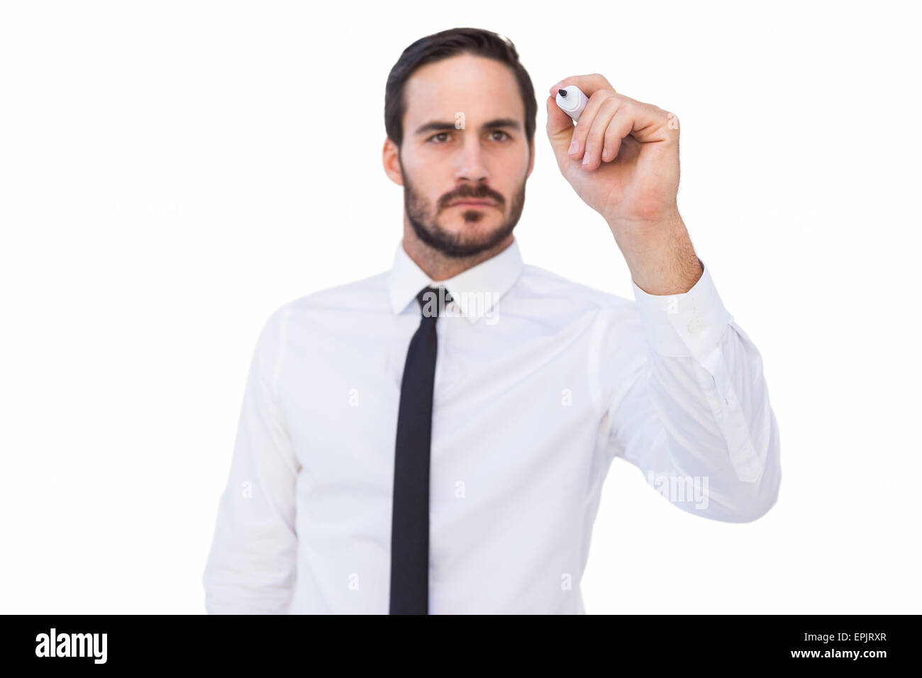 Focused businessman writing with marker Stock Photo - Alamy