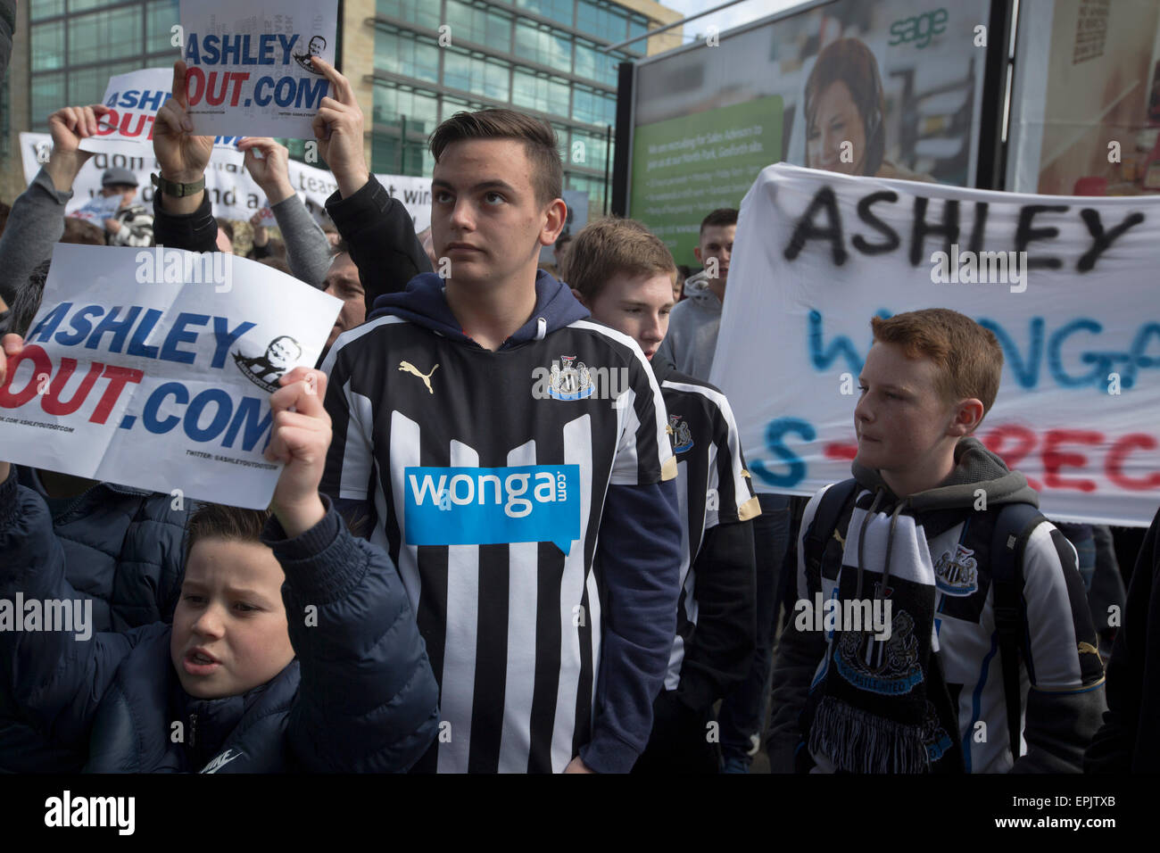 Protesters holding signs during a demonstration at the Gallowgate end of the stadium before Newcastle United host Tottenham Hotspurs in an English Premier League match at St. James' Park. The match was boycotted by a section of the home support critical of the role of owner Mike Ashley and sponsorship by a payday loan company. The match was won by Spurs by 3-1, watched by 47,427, the lowest league gate of the season at the stadium. Stock Photo