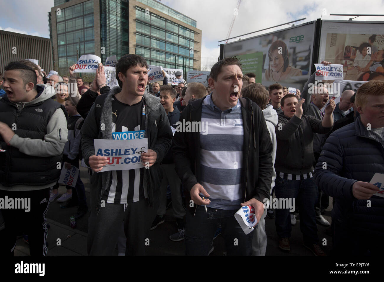 Protesters holding signs and chanting during a demonstration at the Gallowgate end of the stadium before Newcastle United host Tottenham Hotspurs in an English Premier League match at St. James' Park. The match was boycotted by a section of the home support critical of the role of owner Mike Ashley and sponsorship by a payday loan company. The match was won by Spurs by 3-1, watched by 47,427, the lowest league gate of the season at the stadium. Stock Photo