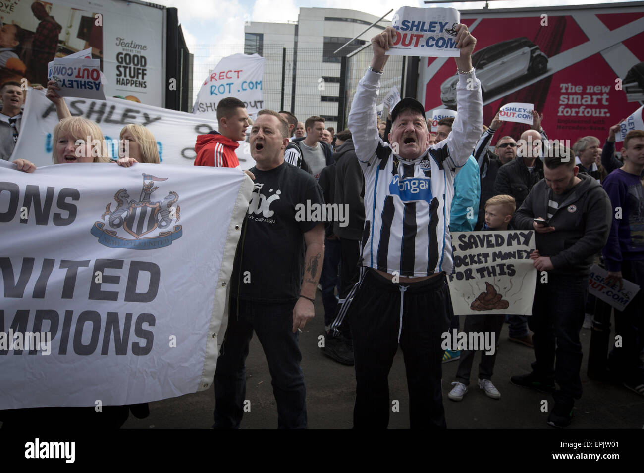 Protesters holding signs and chanting during a demonstration at the Gallowgate end of the stadium before Newcastle United host Tottenham Hotspurs in an English Premier League match at St. James' Park. The match was boycotted by a section of the home support critical of the role of owner Mike Ashley and sponsorship by a payday loan company. The match was won by Spurs by 3-1, watched by 47,427, the lowest league gate of the season at the stadium. Stock Photo