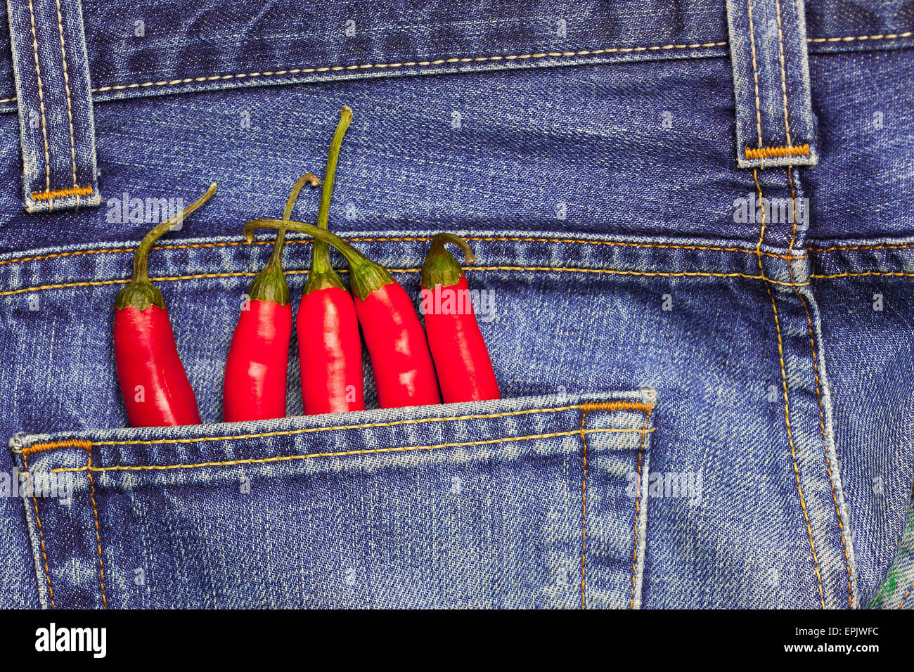 hot chili peppers in a jeans pocket 