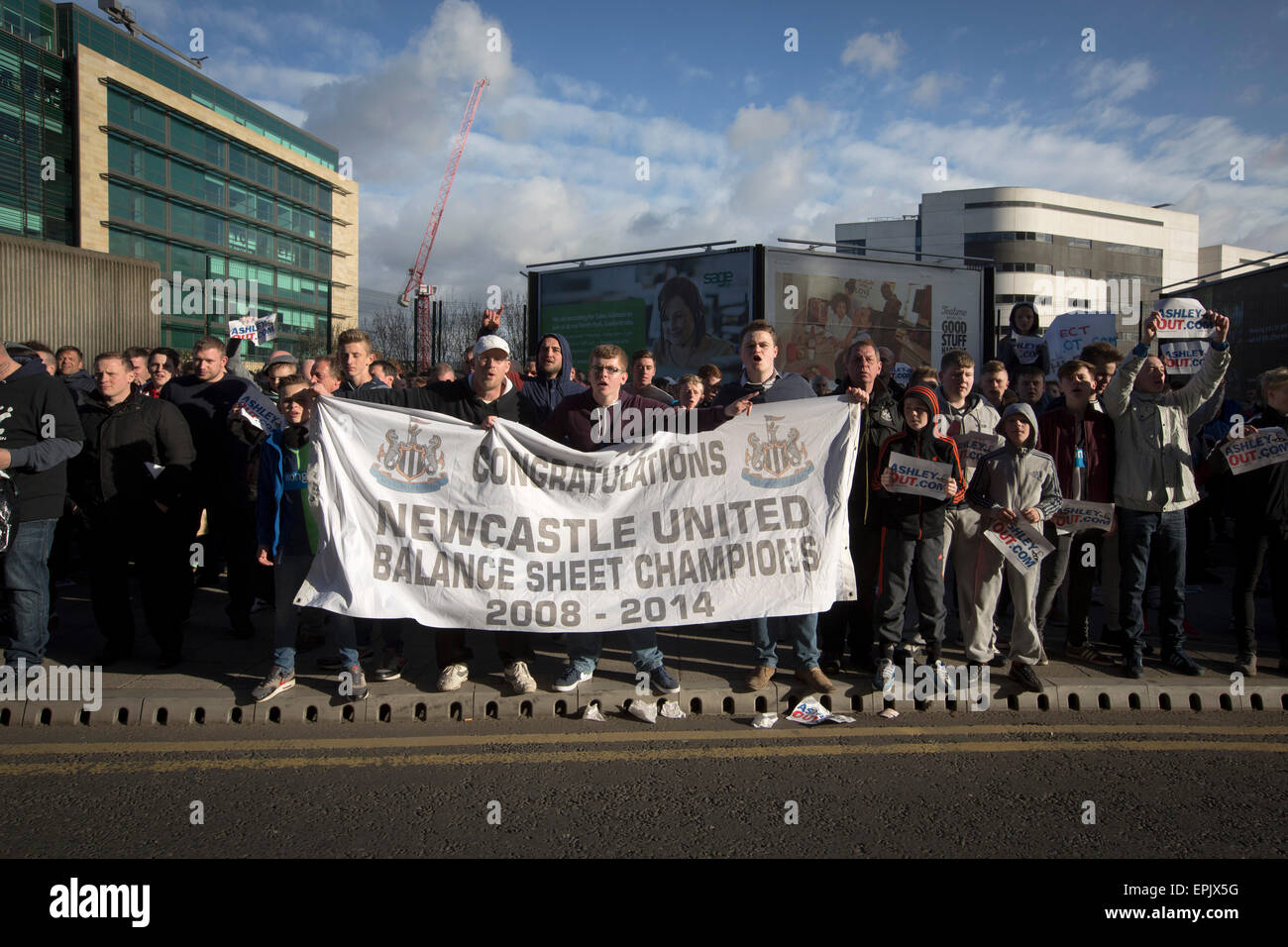 Protesters demonstrating with a banner gathering at the Gallowgate end of the stadium after Newcastle United host Tottenham Hotspurs in an English Premier League match at St. James' Park. The match was boycotted by a section of the home support critical of the role of owner Mike Ashley and sponsorship by a payday loan company. The match was won by Spurs by 3-1, watched by 47,427, the lowest league gate of the season at the stadium. Stock Photo