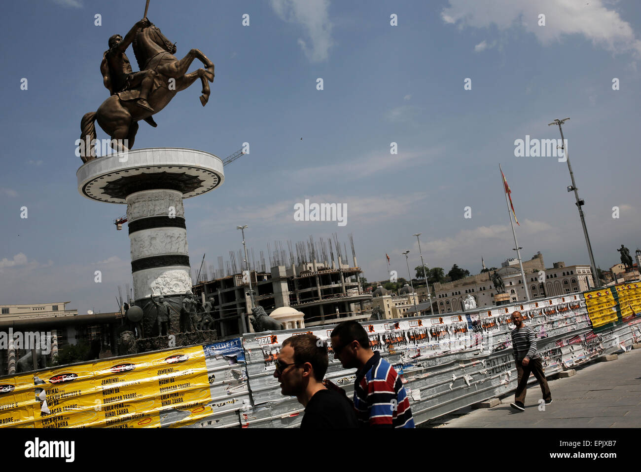 People wak in Macedonia square in central Skopje, FYROM on May 17, 2015. Stock Photo