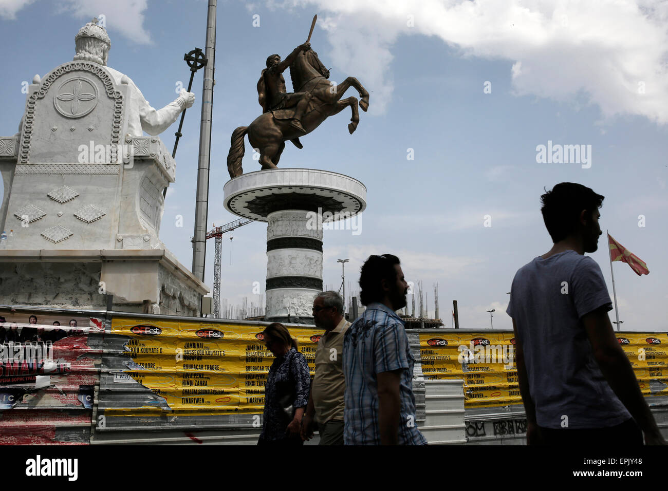 People walk in Macedonia square in central Skopje, FYROM on May 17, 2015. Stock Photo