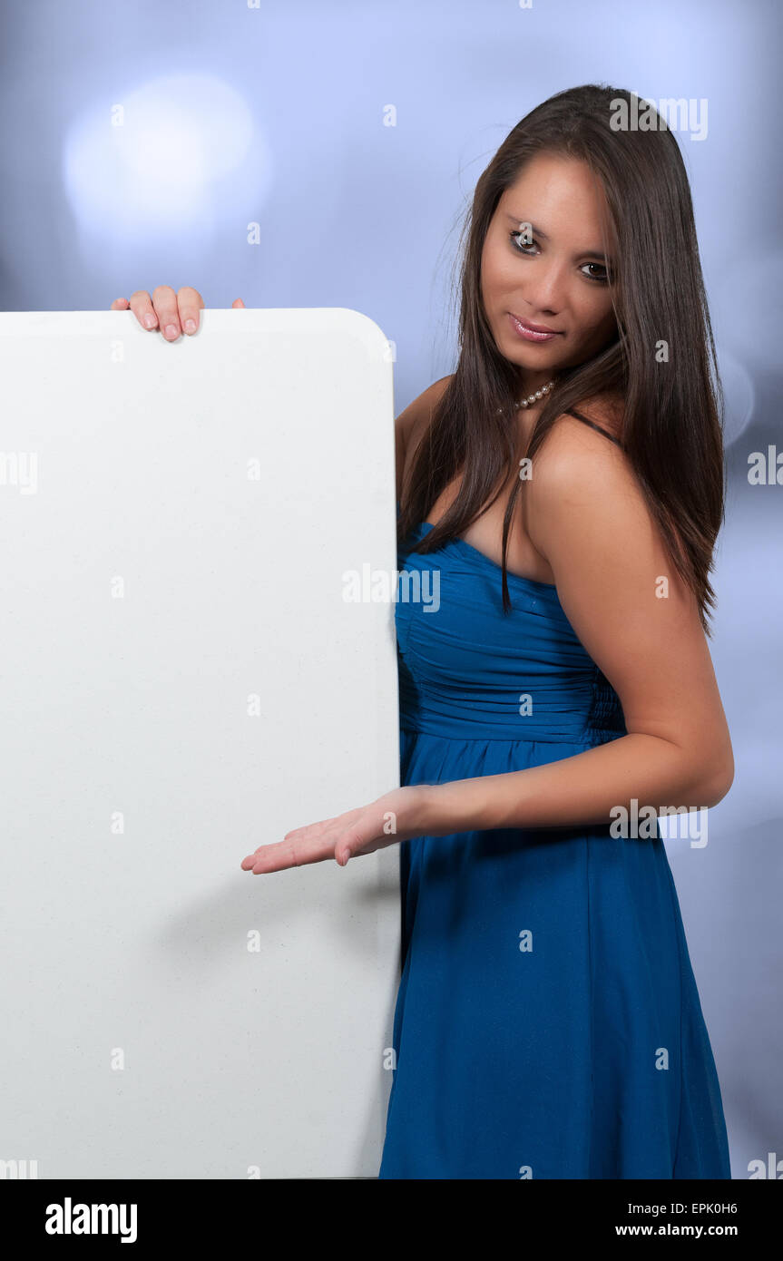 Woman behind a display Stock Photo