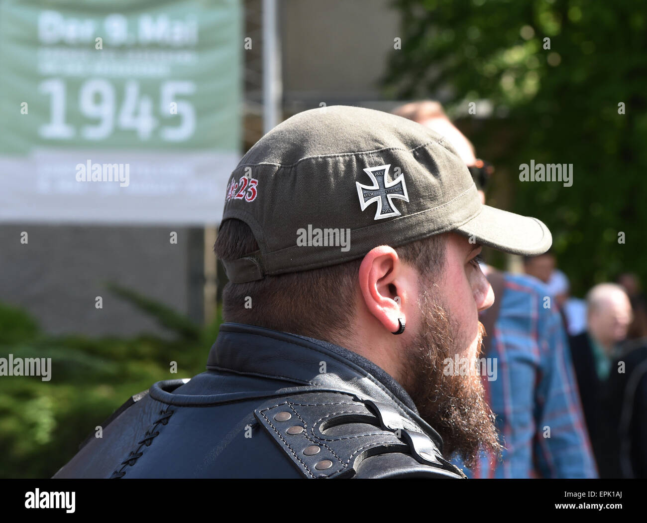 A member of the Russian motorcycle club 'Nachtwoelfe' (lit. Night wolves) wears a basecap with the Iron Cross that refers to the Battle of Kulm in 1813 in the German-Russian Museum in Berlin, Germany, 08 May 2015. The museum is the historical place of the German Instrument of Surrender on 08 May 1945 in Berlin-Karlshorst. The Russian group started the tour on the occasion of the 70th anniversary of the End of World War II in Moscow on 25 April and arrives in Berlin on 09 May - when Russia observes the day of victory over Hitler's. Photo: Jens Kalaene/dpa Stock Photo