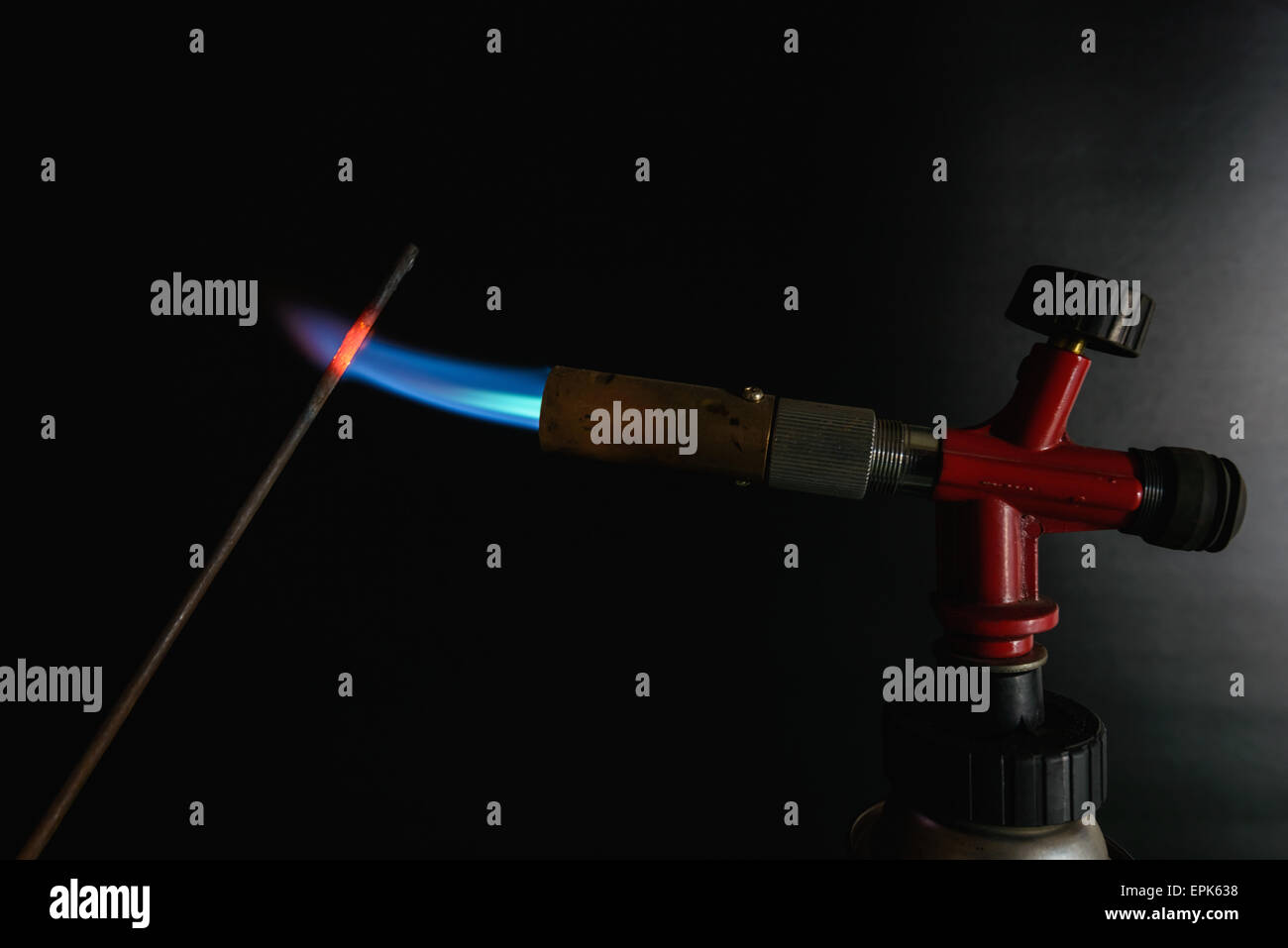 Glass Blowing Artist Forms Blob Glass Vessel Using Gas Torch Stock Photo by  ©mindstorm 224745418