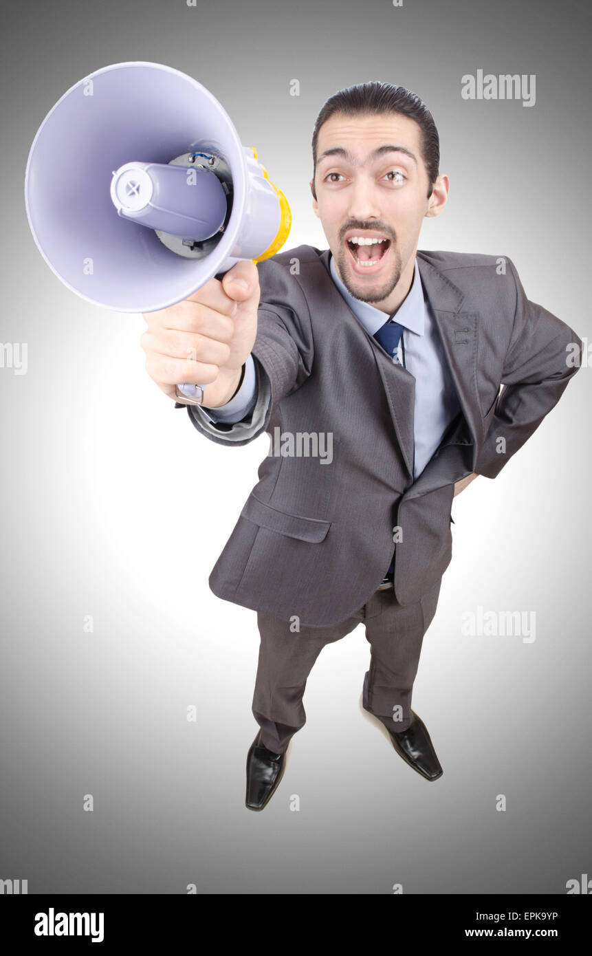 Man shouting and yelling with loudspeaker Stock Photo - Alamy