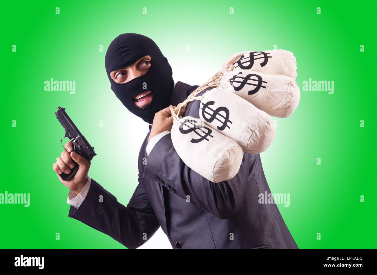 Gangster with bags of money on white Stock Photo