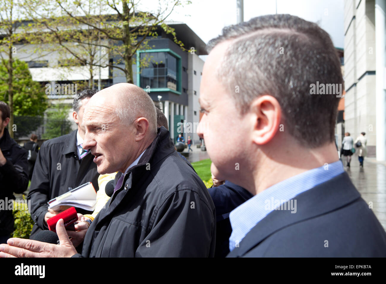 Laganside Courts, Belfast, UK. 19th May, 2015. Michael Wardlow from the Equality Commission with Gareth Lee (R) who took a case against Ashers Bakery who refused to bake a cake on the grounds of their religious beliefs. Credit:  Bonzo/Alamy Live News Stock Photo