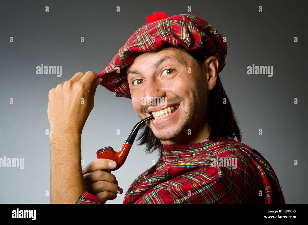 Funny scotsman with smoking pipe Stock Photo Alamy