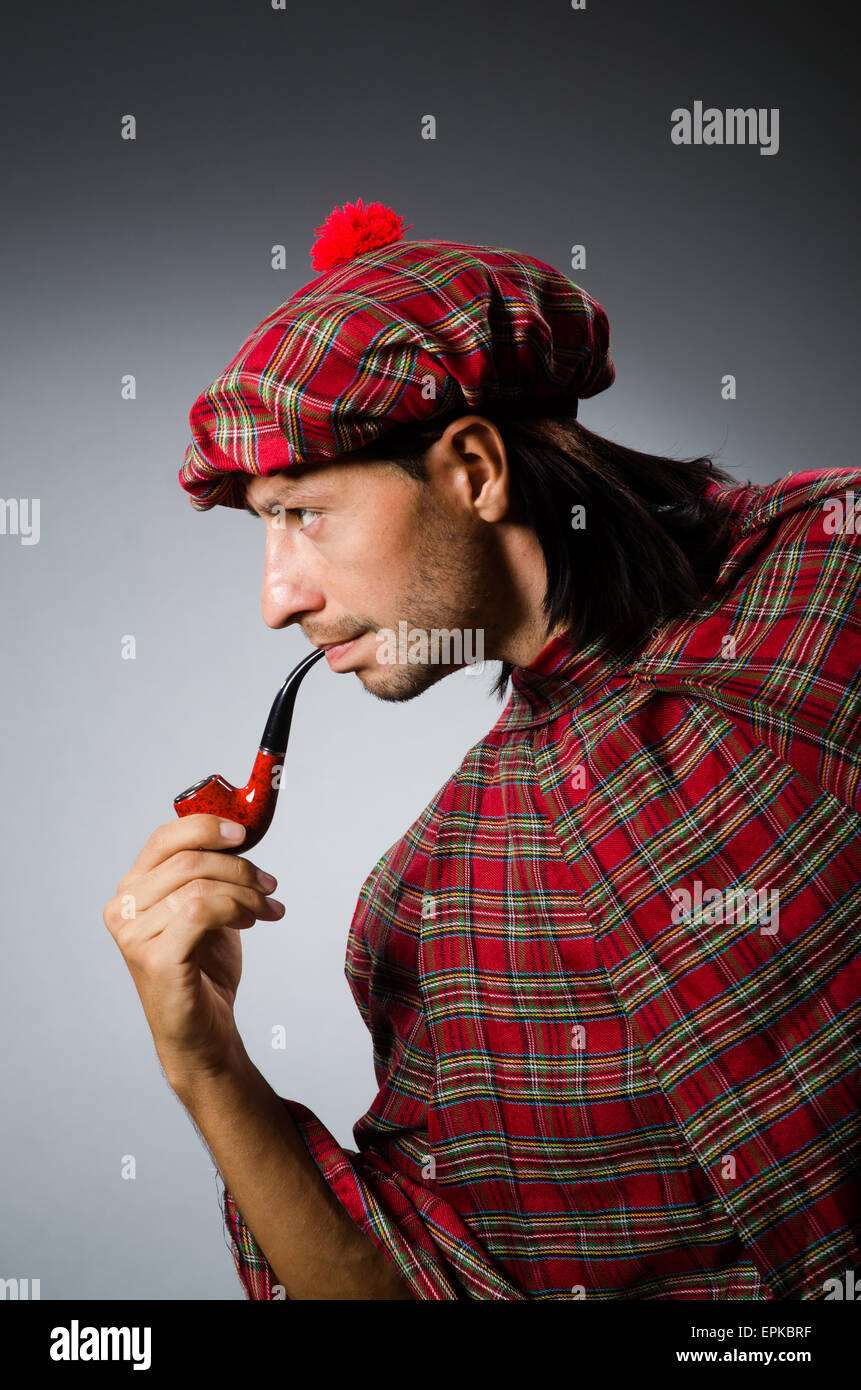 Funny scotsman with smoking pipe Stock Photo Alamy