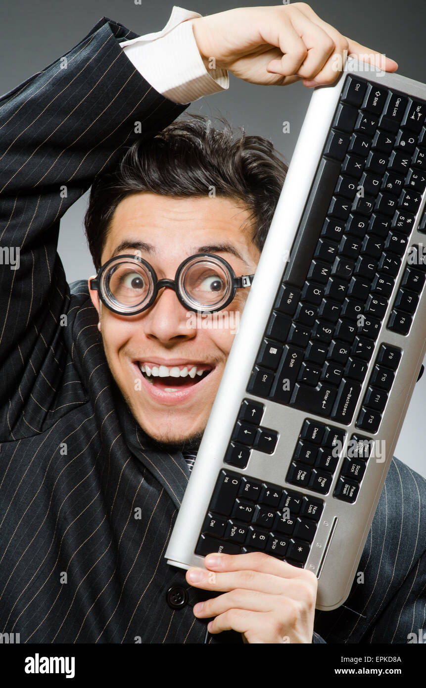 Computer geek with computer keyboard Stock Photo