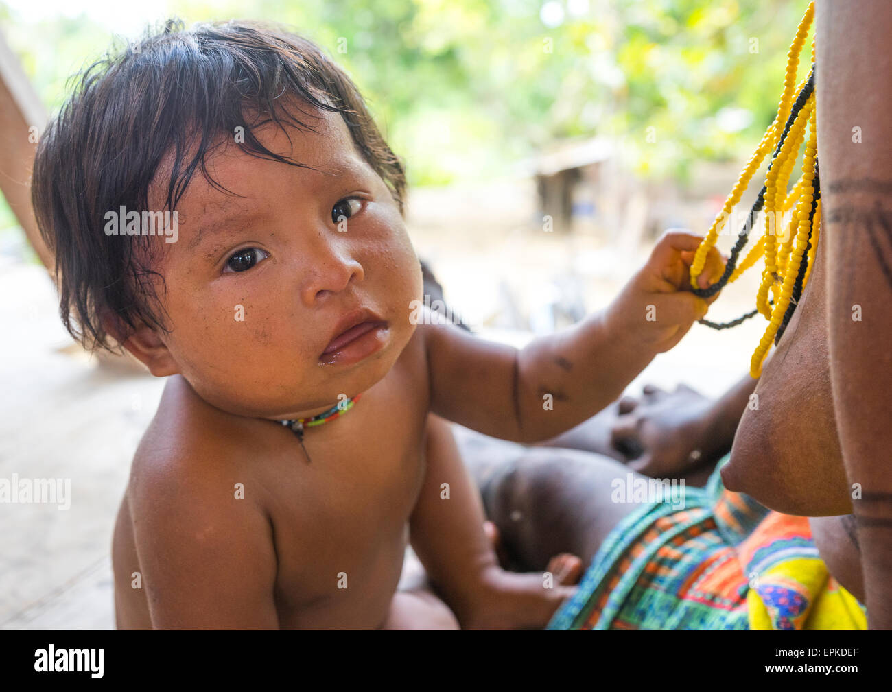 Panama Darien Province Bajo Chiquito Embera Tribe Baby Playing With Necklaces Stock Photo Alamy