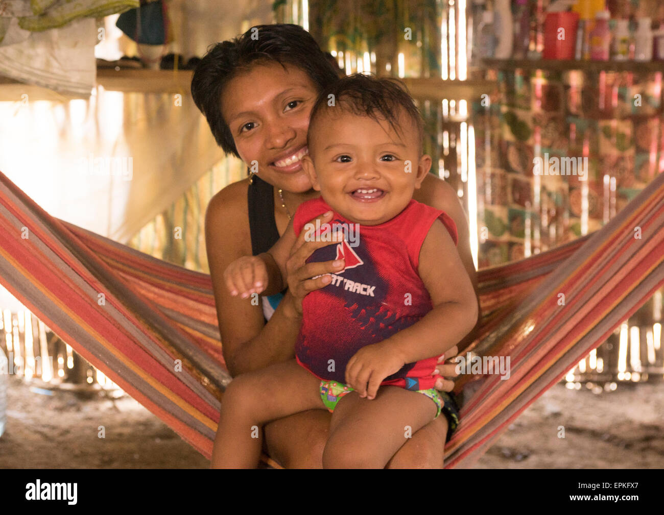Panama San Blas Islands Mamitupu Portrait Of A Smiling Kuna Tribe Mother With Her Baby In A Hammock Stock Photo Alamy
