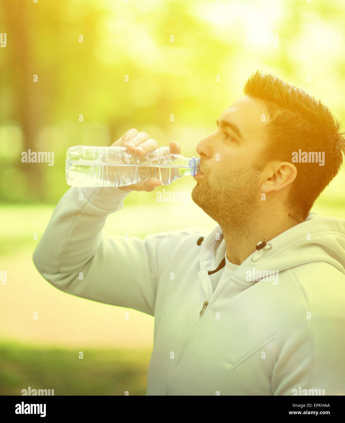 Close-up of plastic fitness shaker bottle in male hand. Sportsman always  taking water with him. Unrecognizable man leading healthy lifestyle.  Refreshm Stock Photo - Alamy