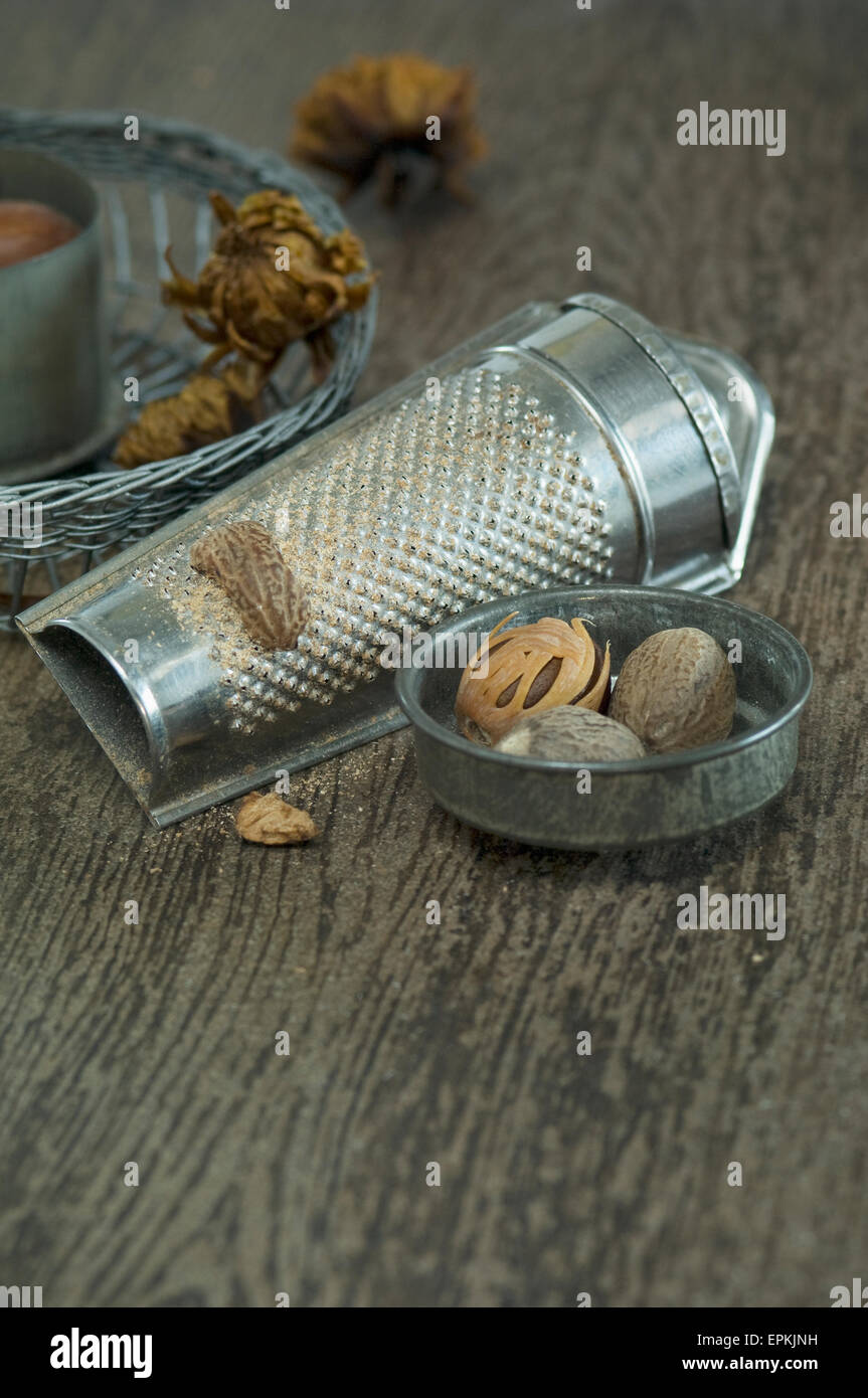 Nutmegs and nutmeg grater Stock Photo Alamy