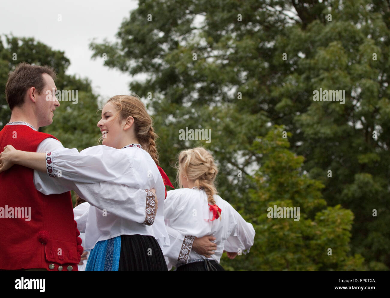 Folk dancing couple in traditional Polish dress Stock Photo