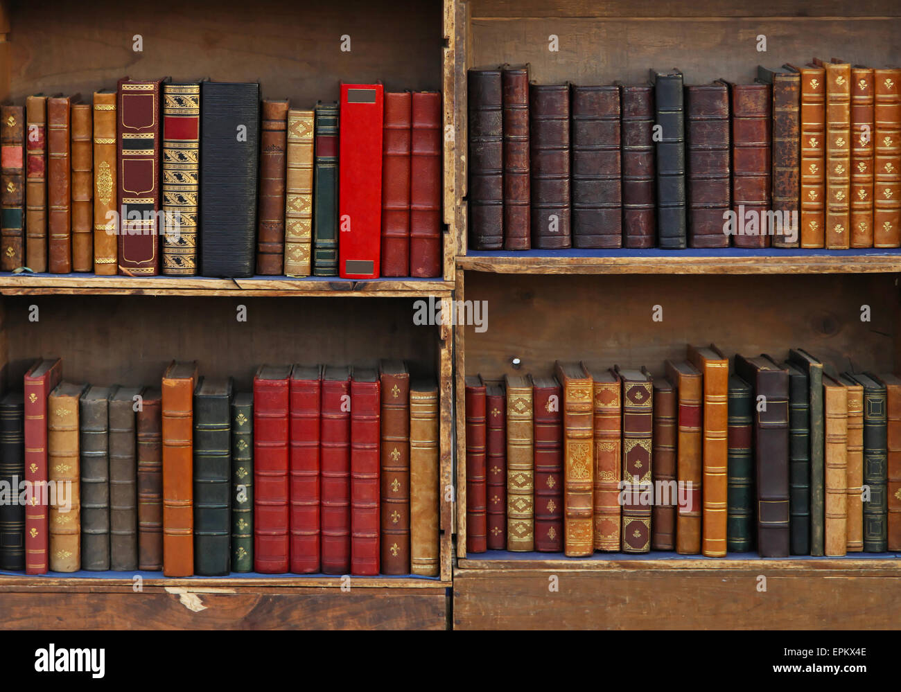 Vintage books in old bookcase Stock Photo
