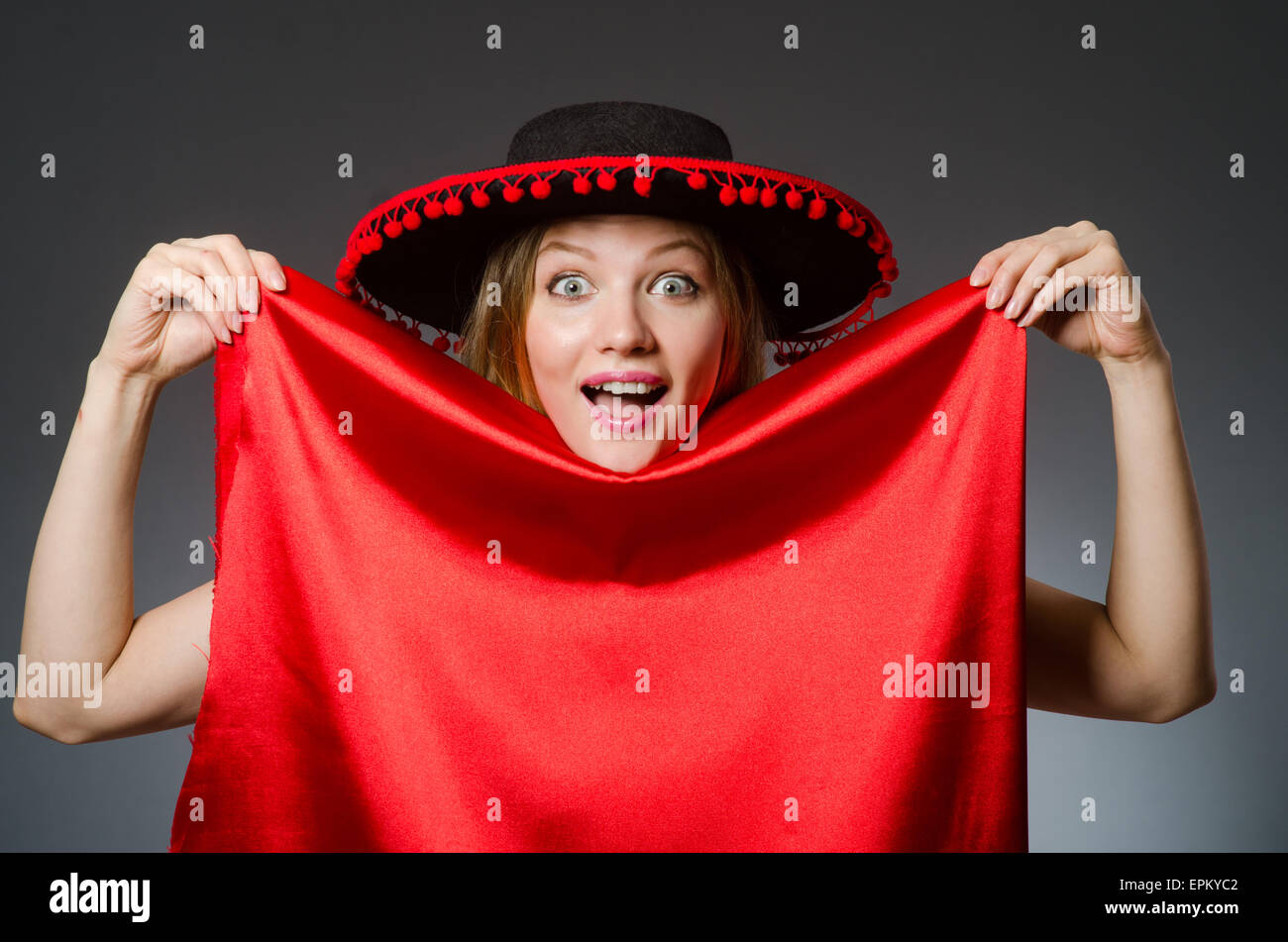 Woman wearing sombrero hat in funny concept Stock Photo