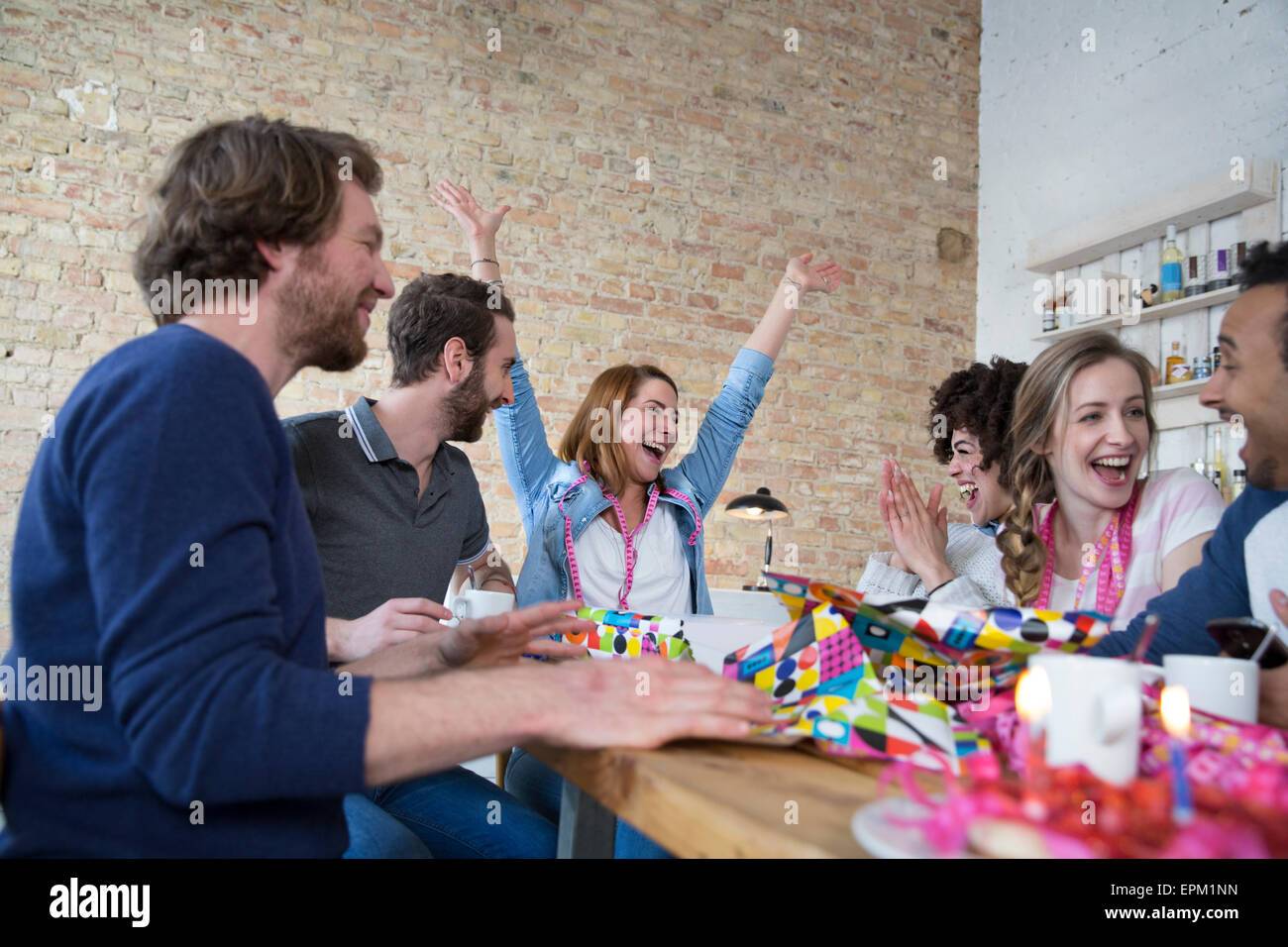 Group of friends celebrating birthday Stock Photo - Alamy